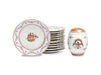 A Group of Twelve Japanese Porcelain "American Ship" Dessert Plates and a Similar Barrel-Form Box