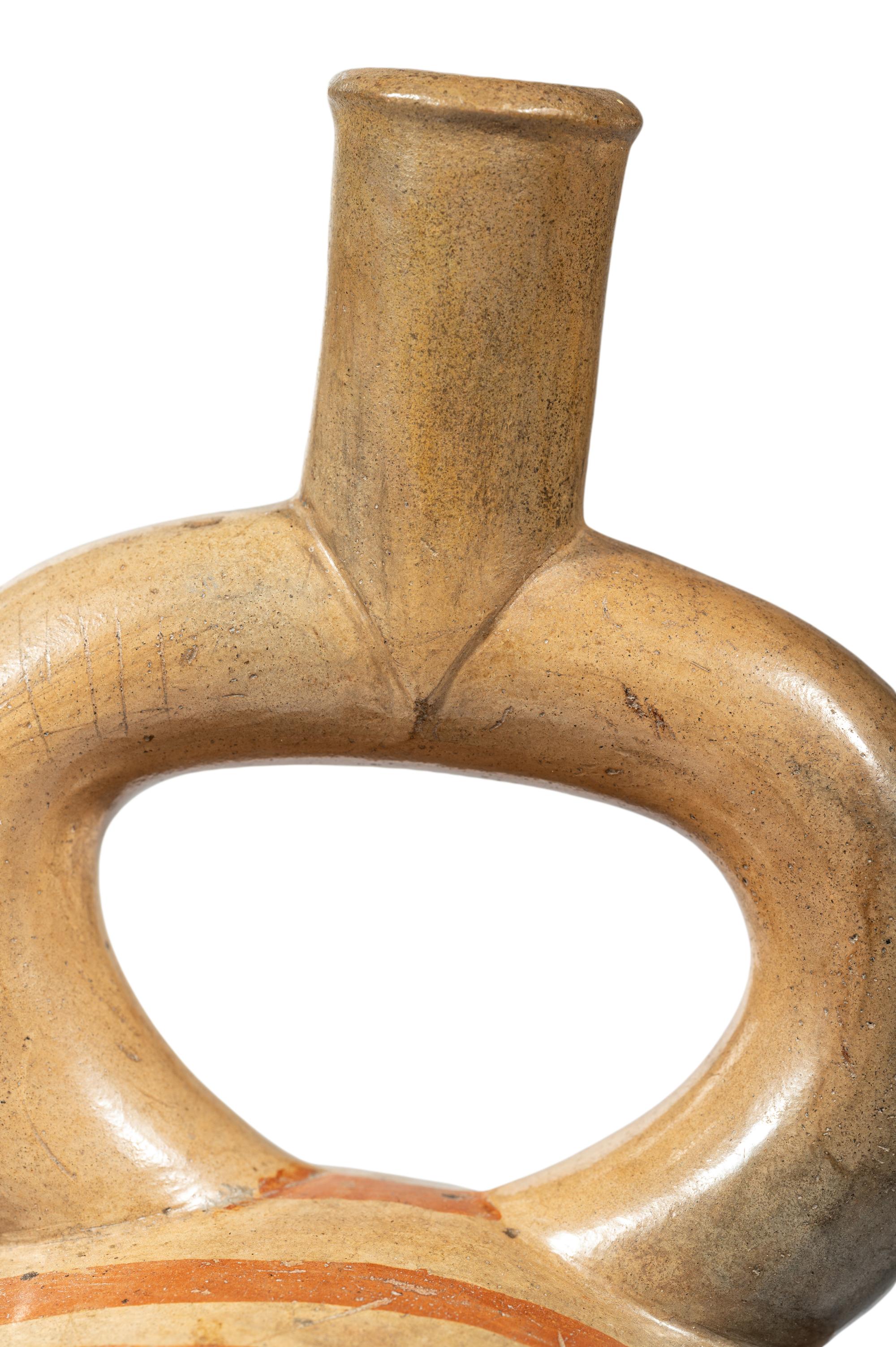 A Moche Portrait Head Vessel
