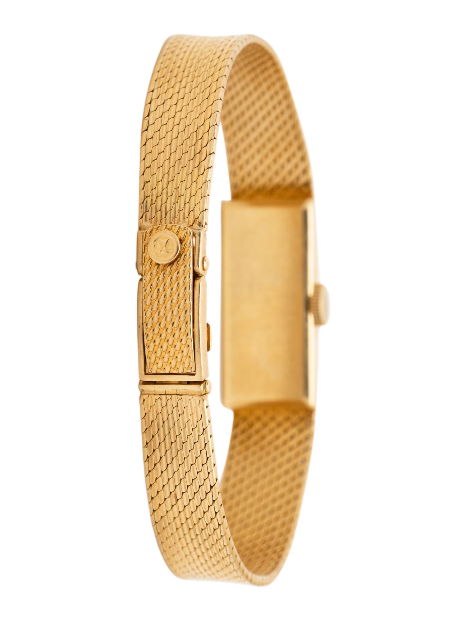 GÜBELIN, 18K YELLOW GOLD WATCH