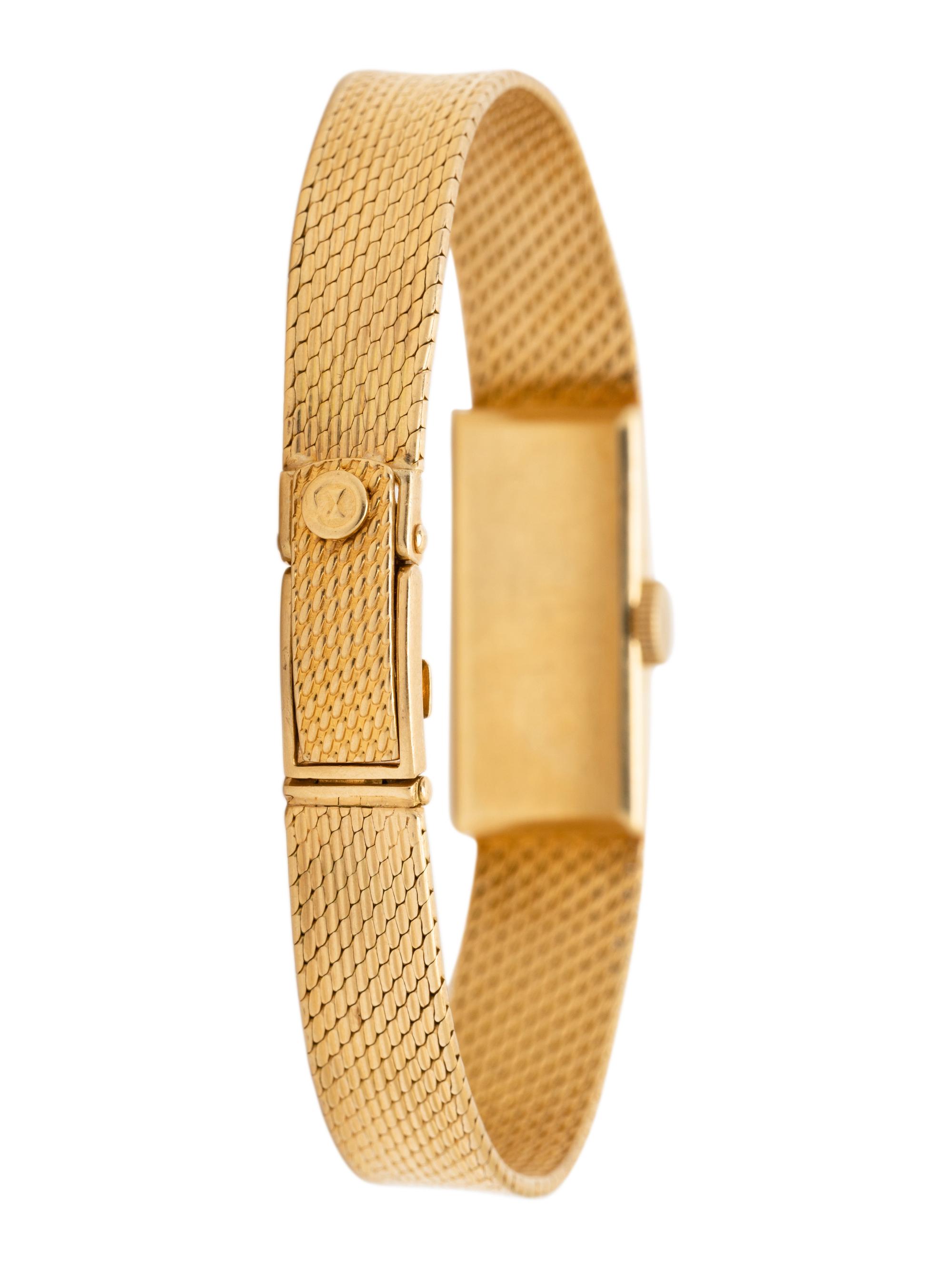 GÜBELIN, 18K YELLOW GOLD WATCH