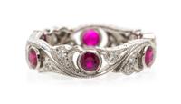 A Platinum, Ruby and Diamond Eternity Band, 3.60 dwts.
