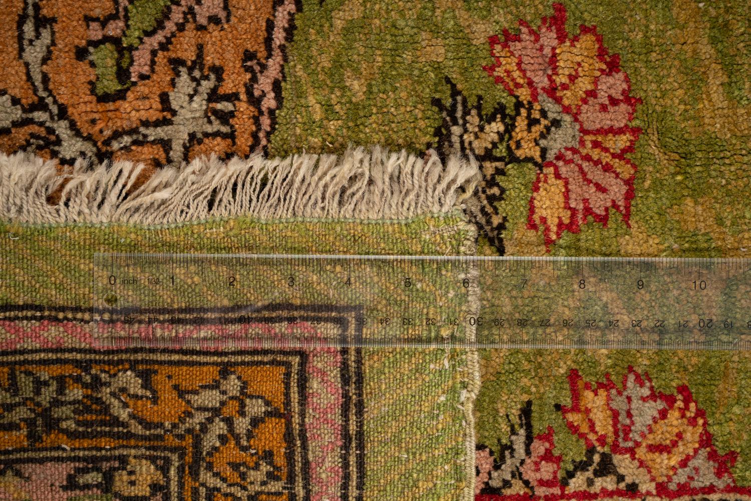 A Persian Wool and Silk Rug