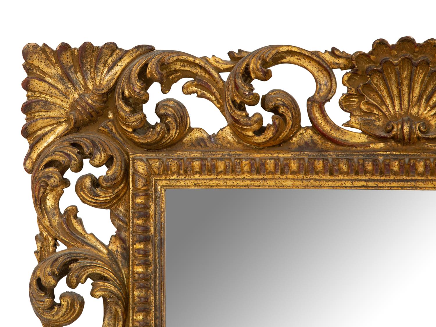 A Louis XV Style Carved Giltwood Mirror
