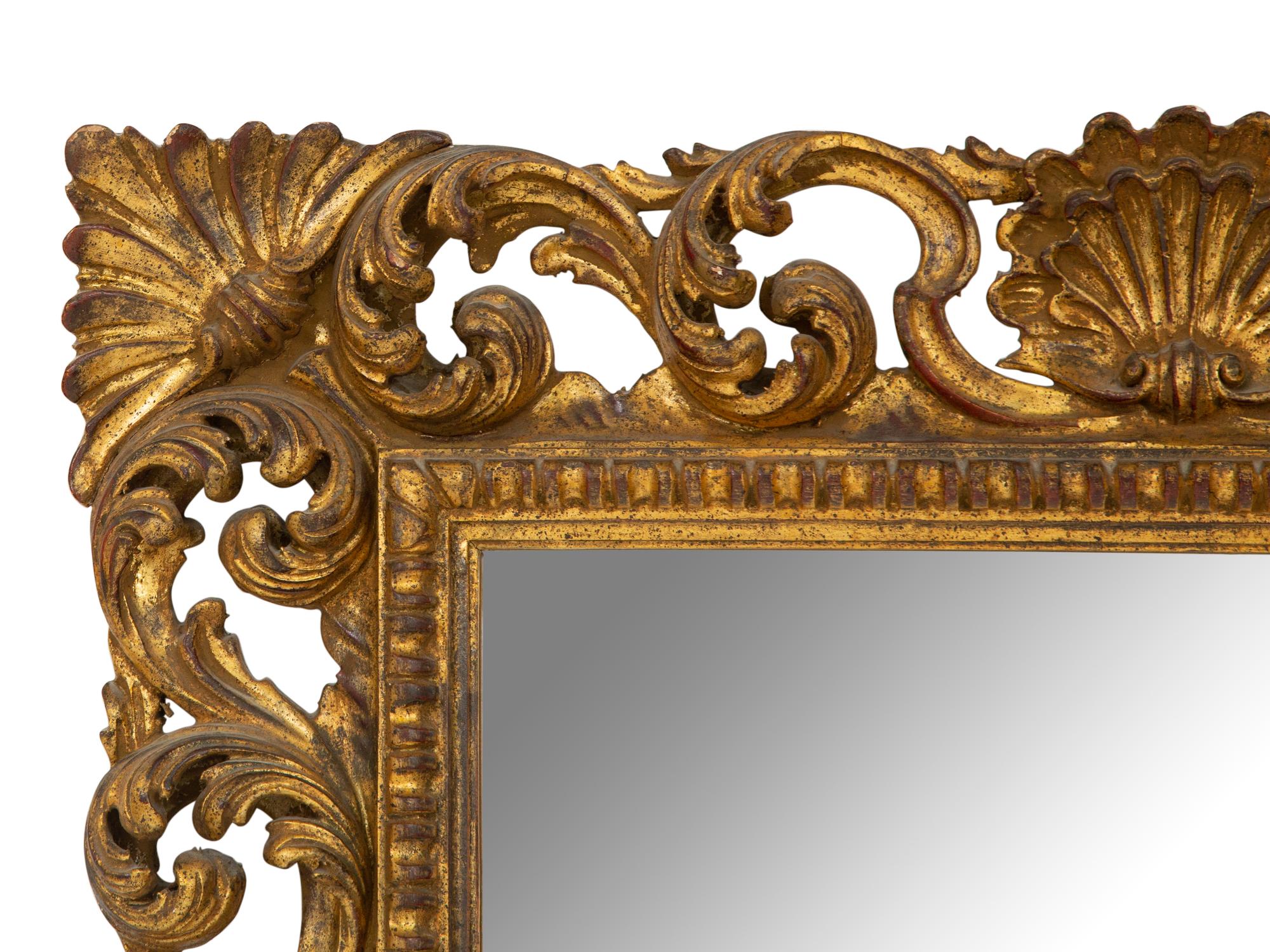 A Louis XV Style Carved Giltwood Mirror