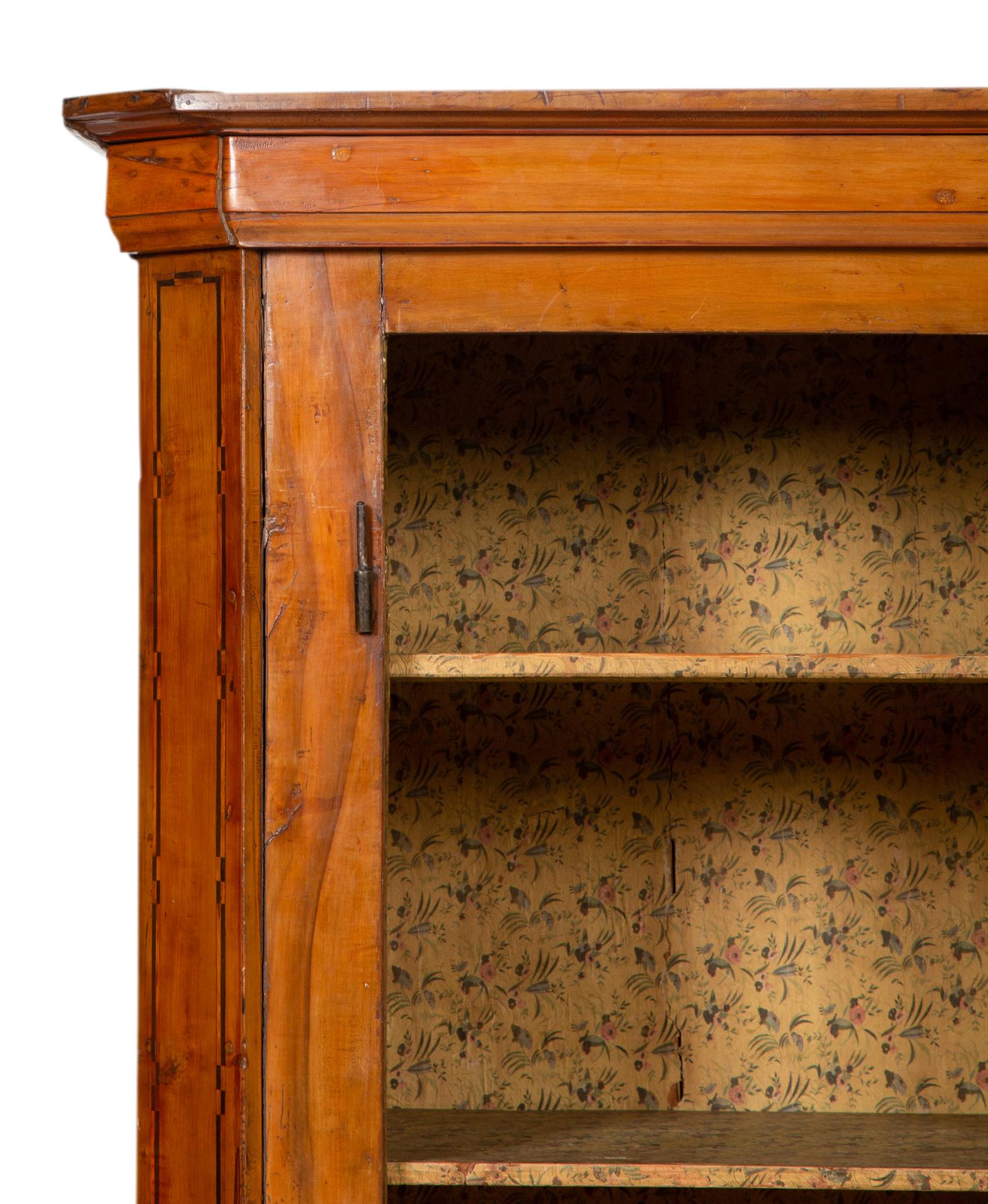 A Continental Olivewood Armoire