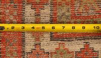A Sarouk Mat and a Caucasian Mat