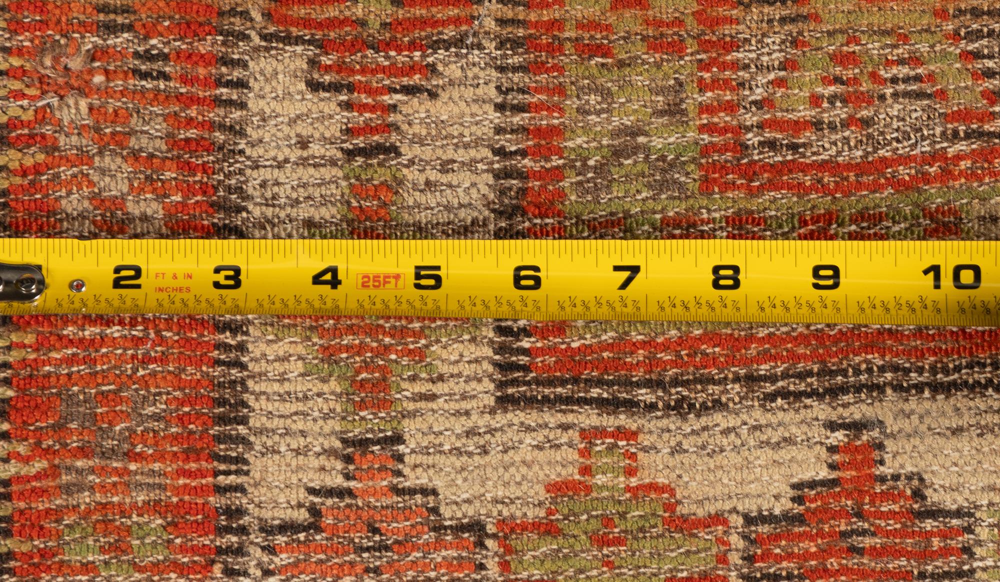 A Sarouk Mat and a Caucasian Mat