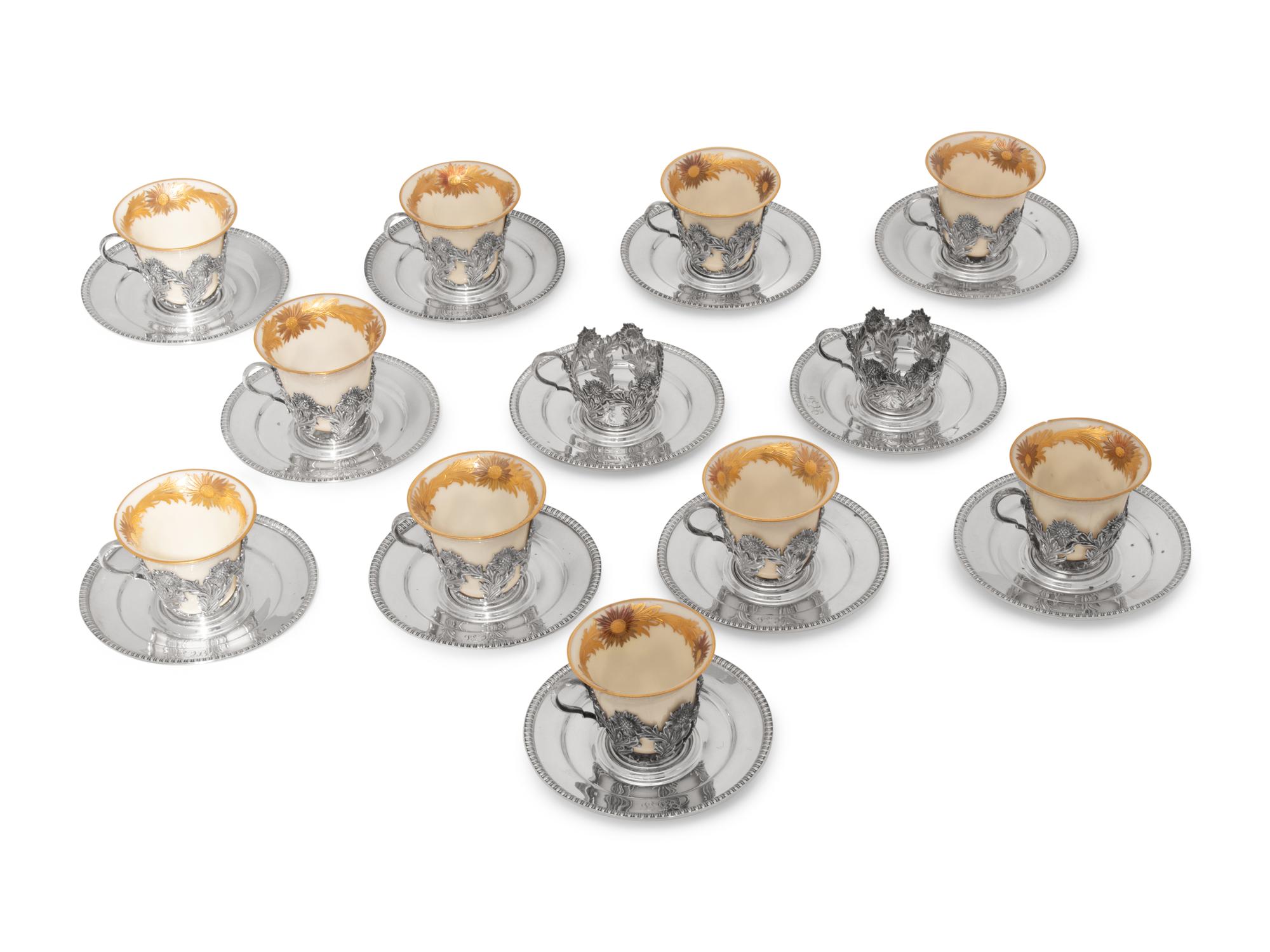 A Set of Twelve Tiffany and Co. Silver Coffee Cups and Saucers