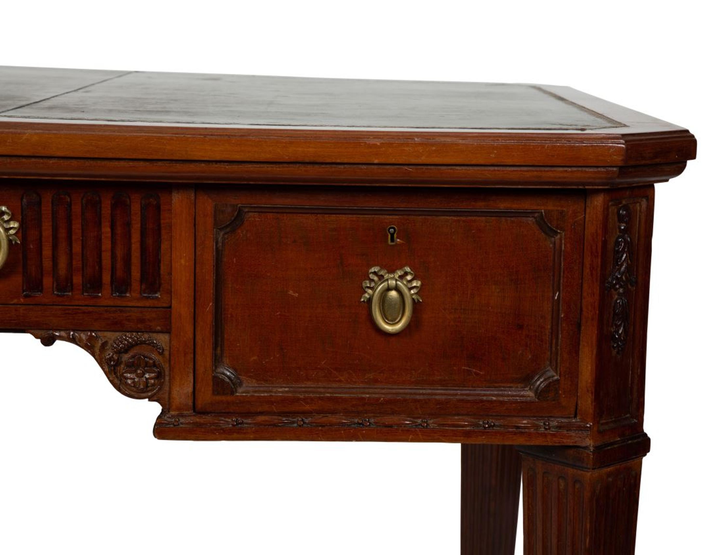 A Neoclassical Style Mahogany Writing Desk — EARLY 20TH CENTURY