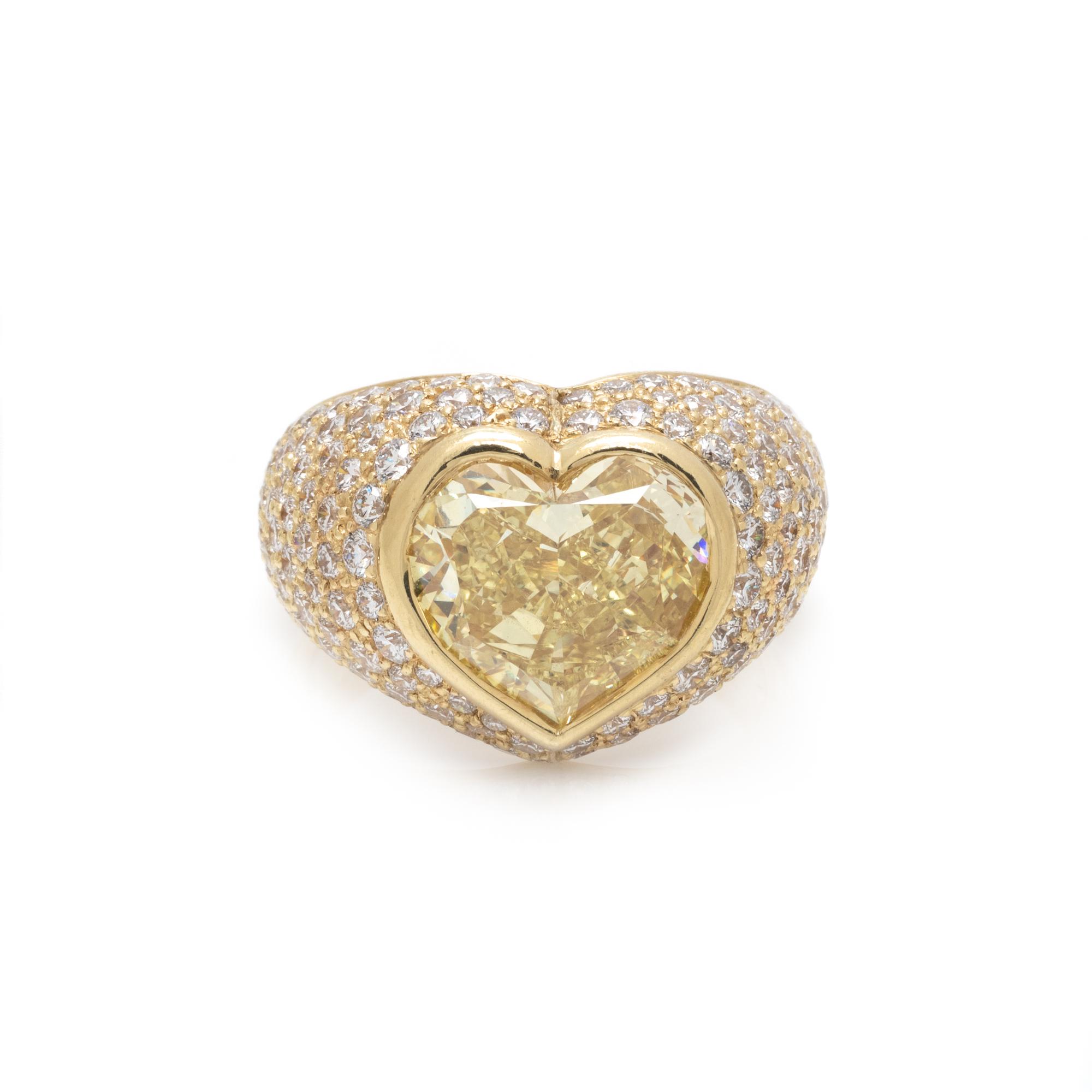 FANCY INTENSE YELLOW DIAMOND AND DIAMOND RING