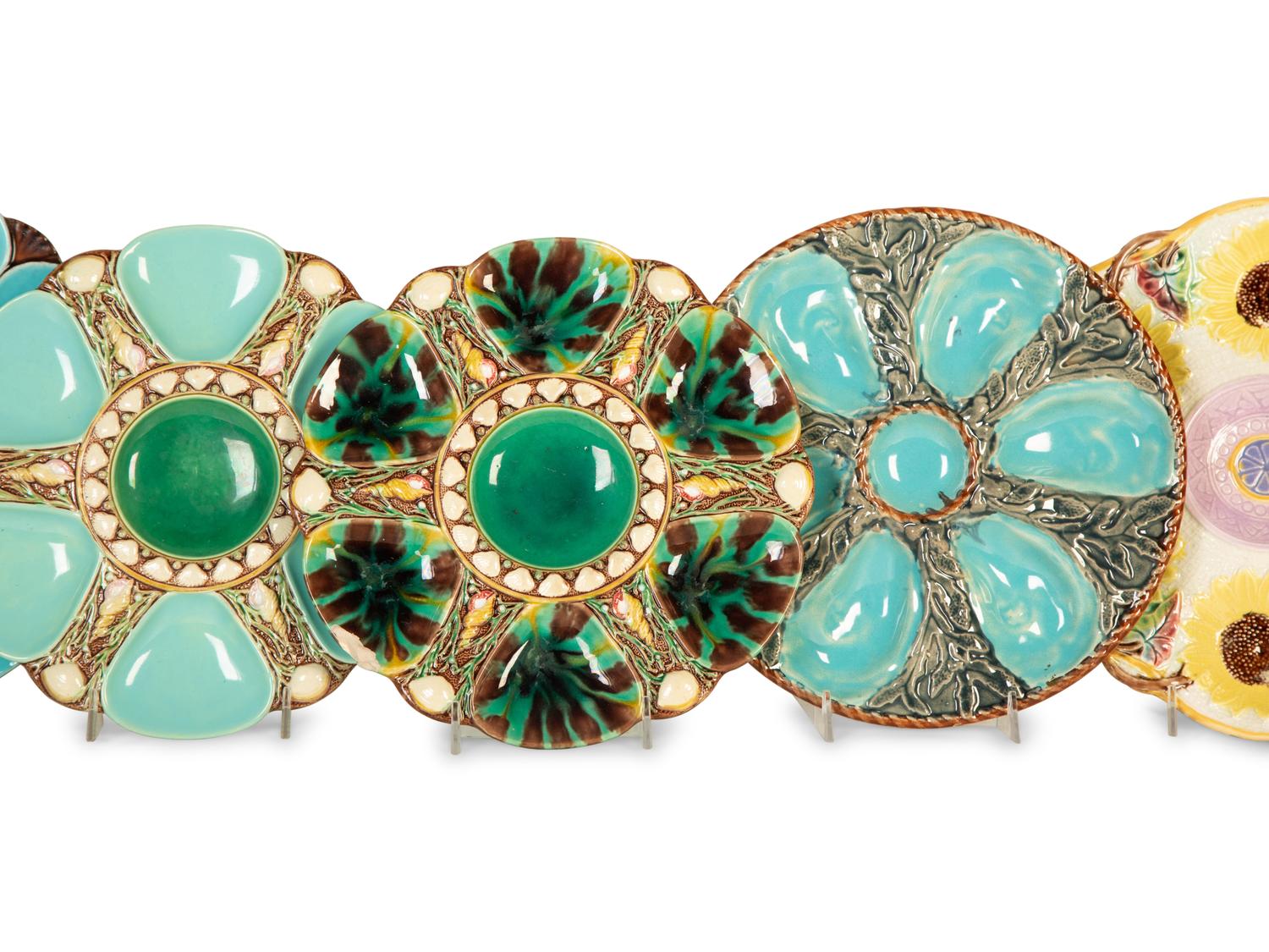 A Group of Eight English and French Majolica Six-Well Oyster Plates — Mid-19th Century