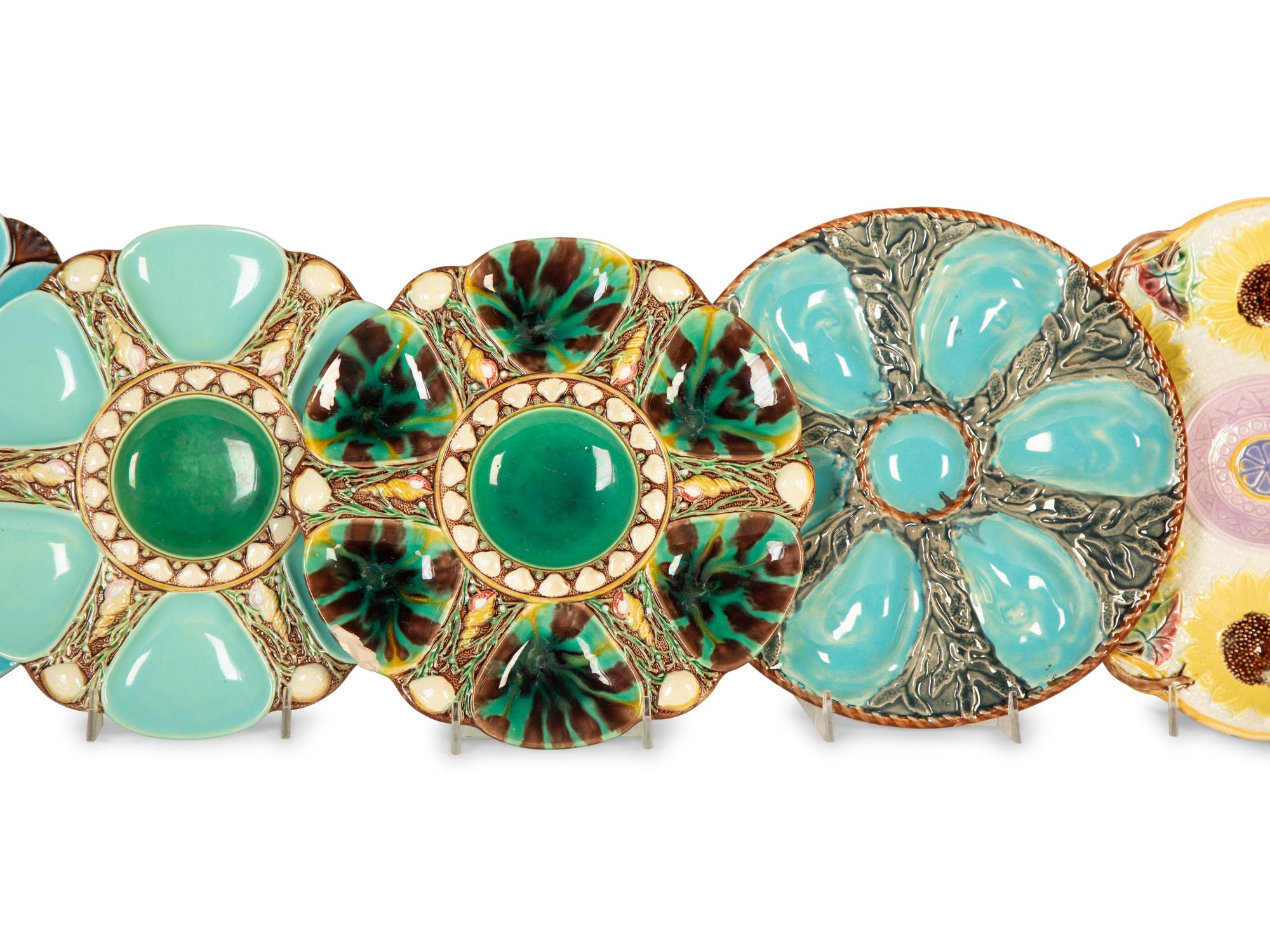 A Group of Eight English and French Majolica Six-Well Oyster Plates — Mid-19th Century