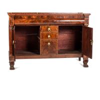 A Classical Brass Inlaid, Carved and Figured Mahogany Sideboard