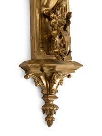 A Pair of Gothic Style Brass Three-Light Sconces
