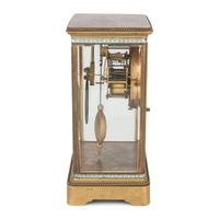 A Japy Freres Gilt Bronze and Champleve Clock