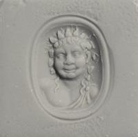 A Roman Citrine Ring Stone with the Bust of a Youthful Satyr — Set in a gold ring