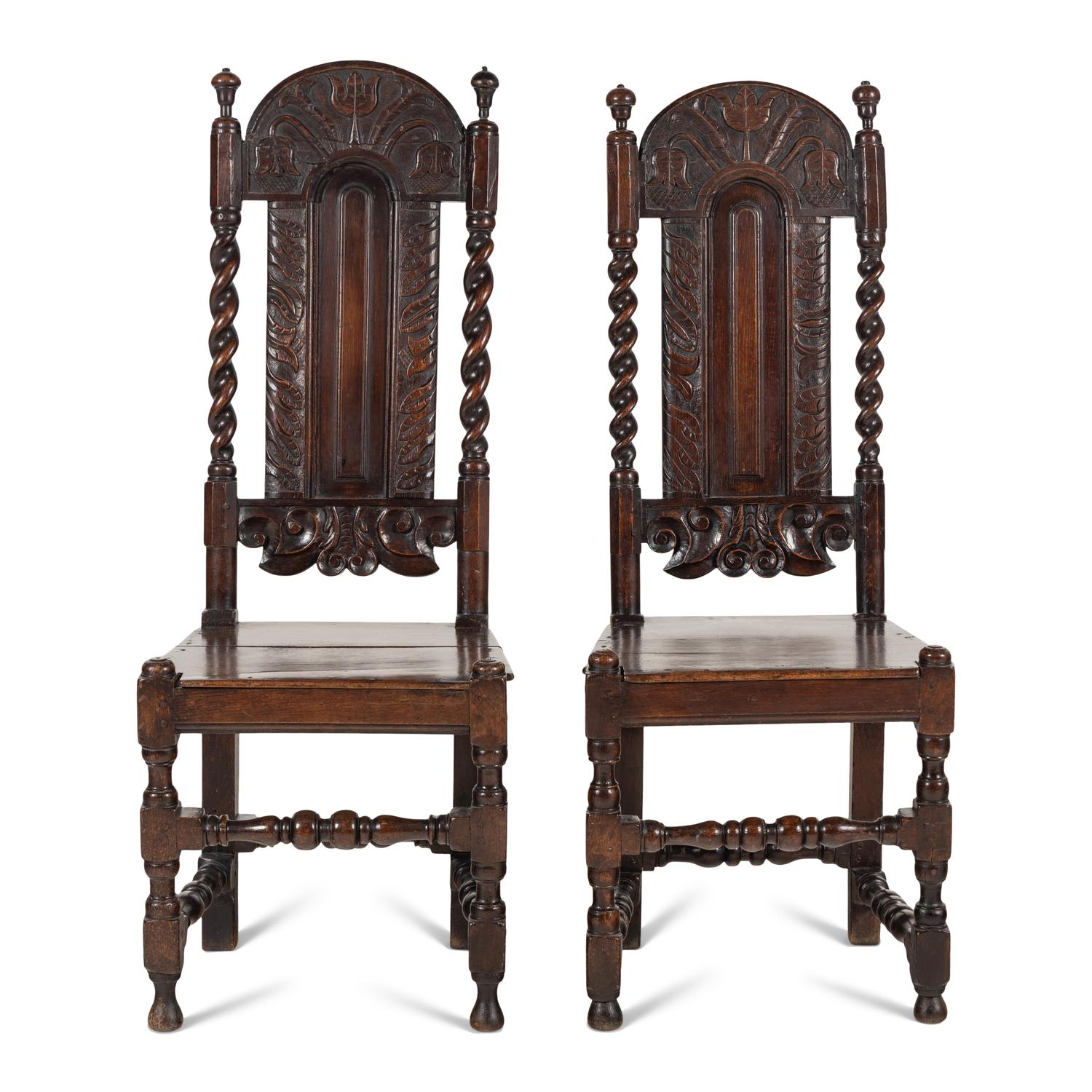 A Matched Pair of Charles II Carved Oak Side Chairs