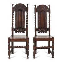 A Matched Pair of Charles II Carved Oak Side Chairs