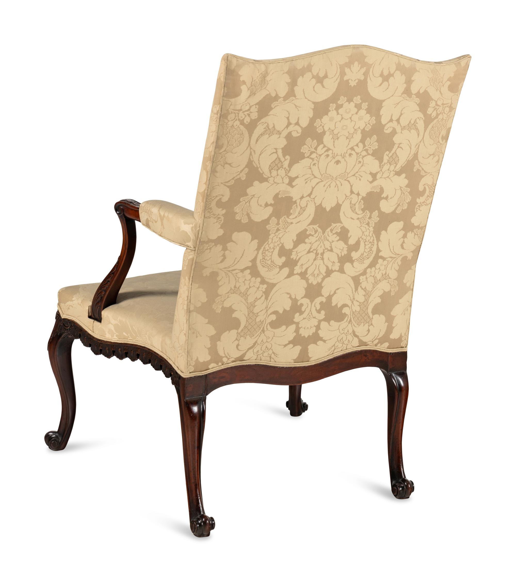 A George III Carved Mahogany Library Chair