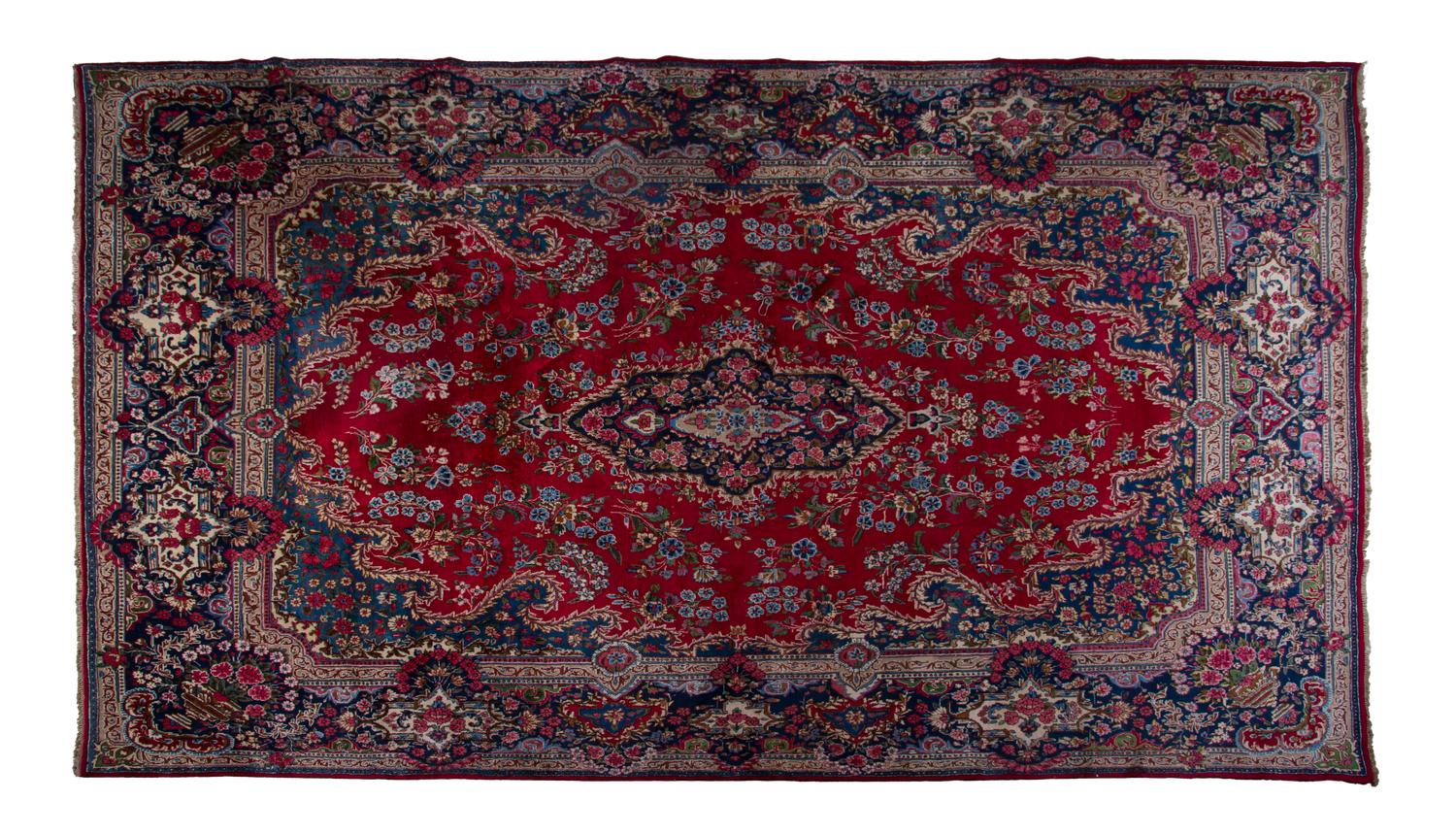 A Kashan Wool Rug, 16 feet 9 inches x 9 feet 11 inches.