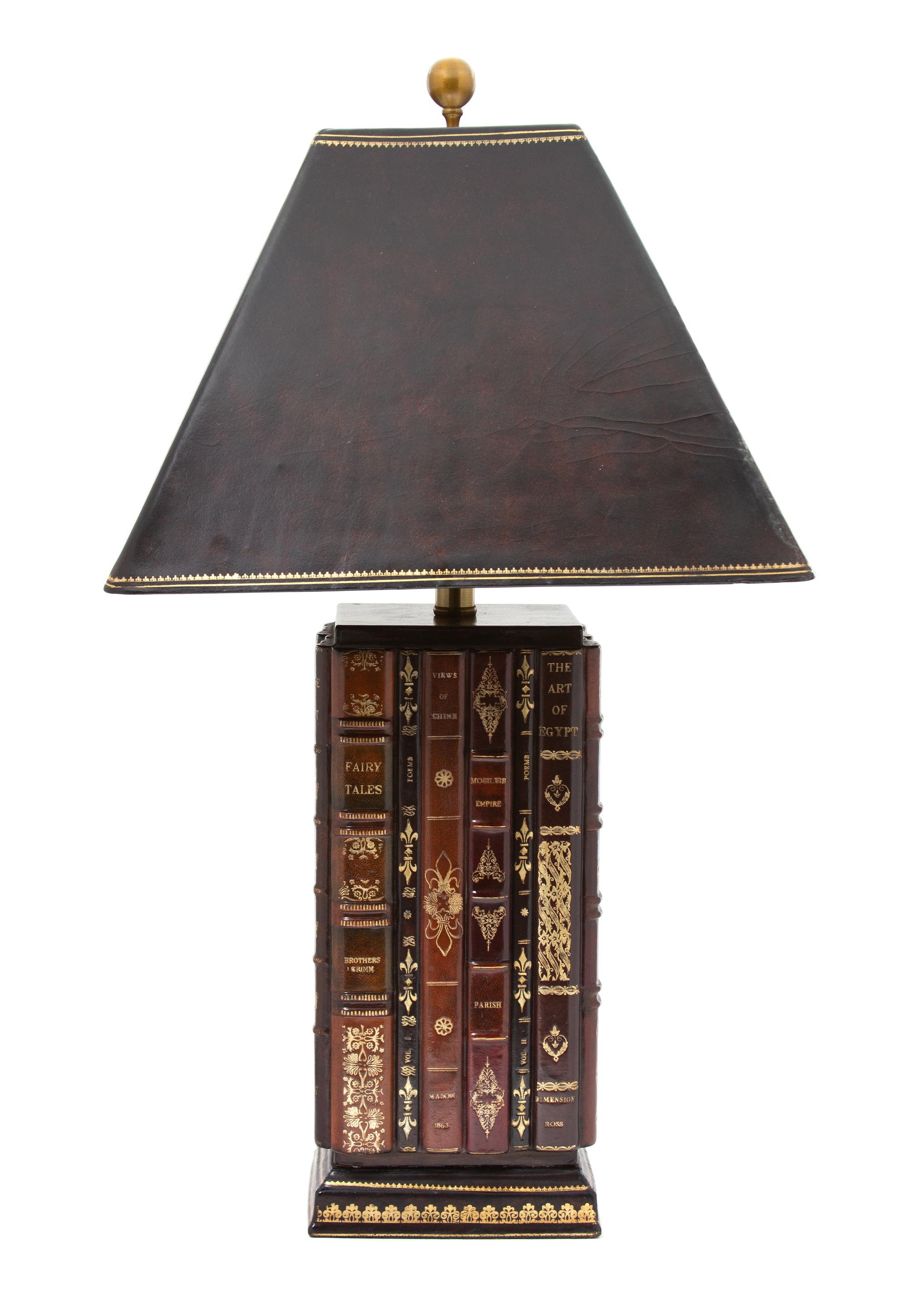 A Leather Book Spine Clad Table Lamp with Black Leather Shade Height 29 1/2 inches. — 20TH CENTURY