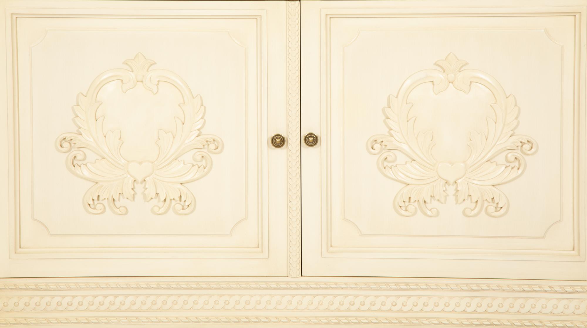 A Louis XVI Style White Painted Four-Door Armoire by Julia Gray, New York