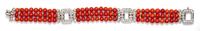 An Art Deco Platinum, Diamond and Coral Bead Bracelet, 18.40 dwts.