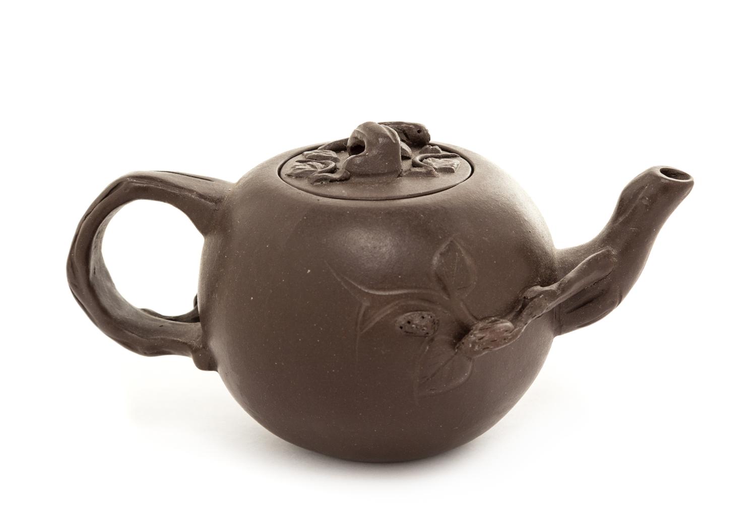 A Yixing Pottery Teapot Height 2 1/2 inches.