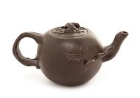 A Yixing Pottery Teapot Height 2 1/2 inches.