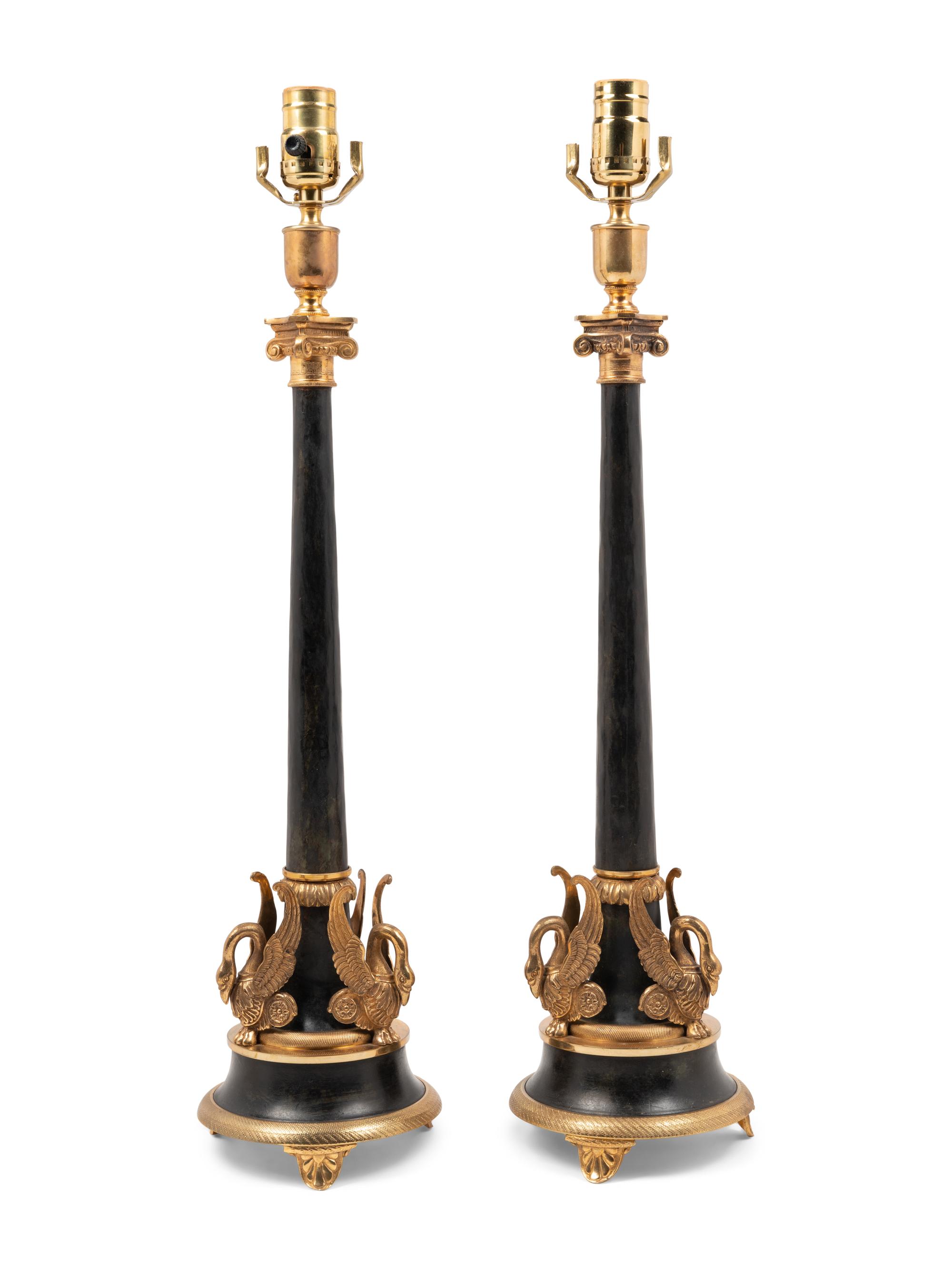 A Pair of Empire Style Gilt Metal Mounted Lamps