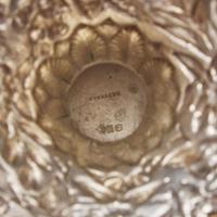 A sterling silver floral repoussé footed bowl and stand Peter L. Krider Co., Philadelphia, PA and Gorham Mfg. Co., Providence, RI, dated "1878," and 1897-1899, respectively