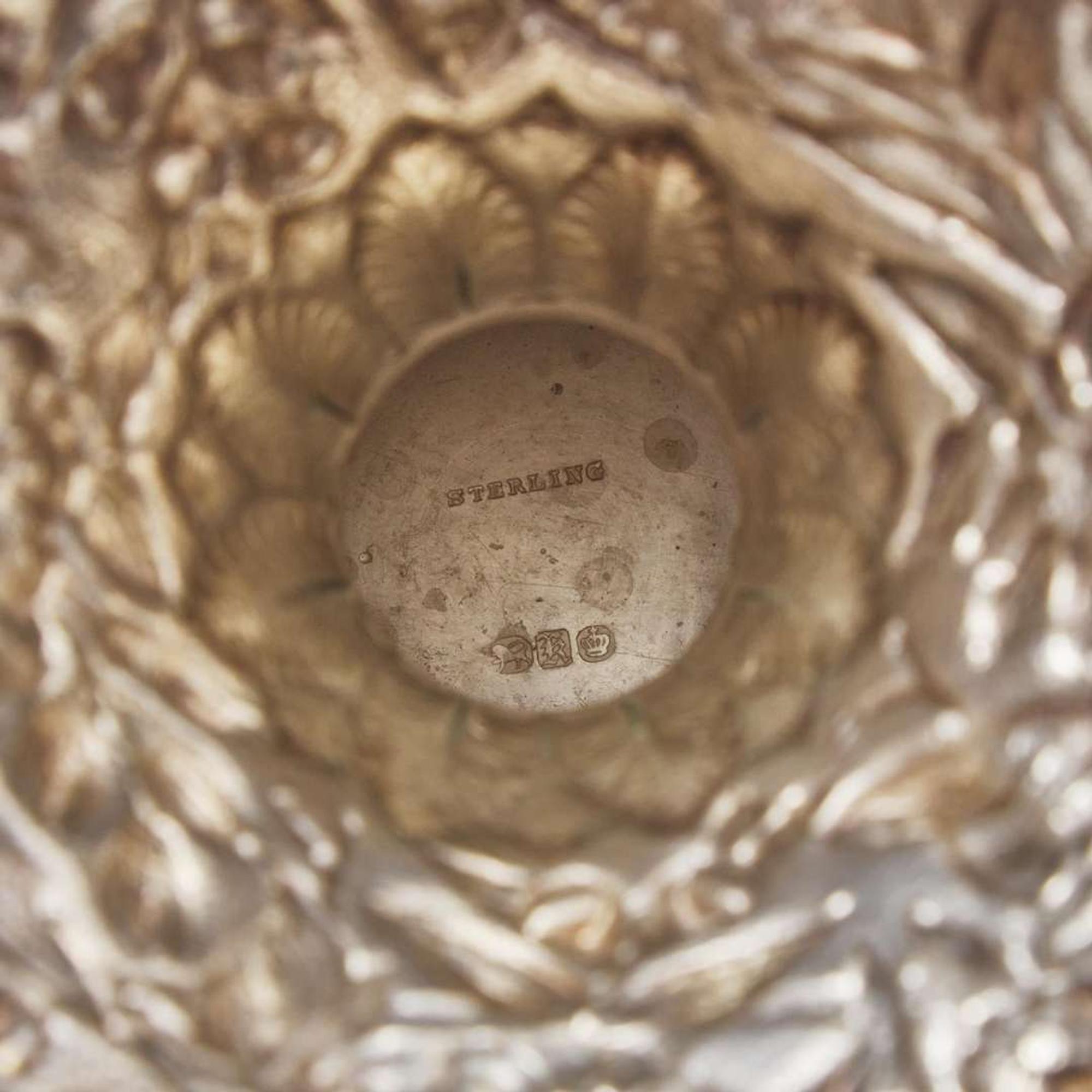 A sterling silver floral repoussé footed bowl and stand Peter L. Krider Co., Philadelphia, PA and Gorham Mfg. Co., Providence, RI, dated "1878," and 1897-1899, respectively