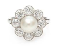 An Edwardian Platinum, Natural Pearl and Diamond Ring, 2.90 dwts.