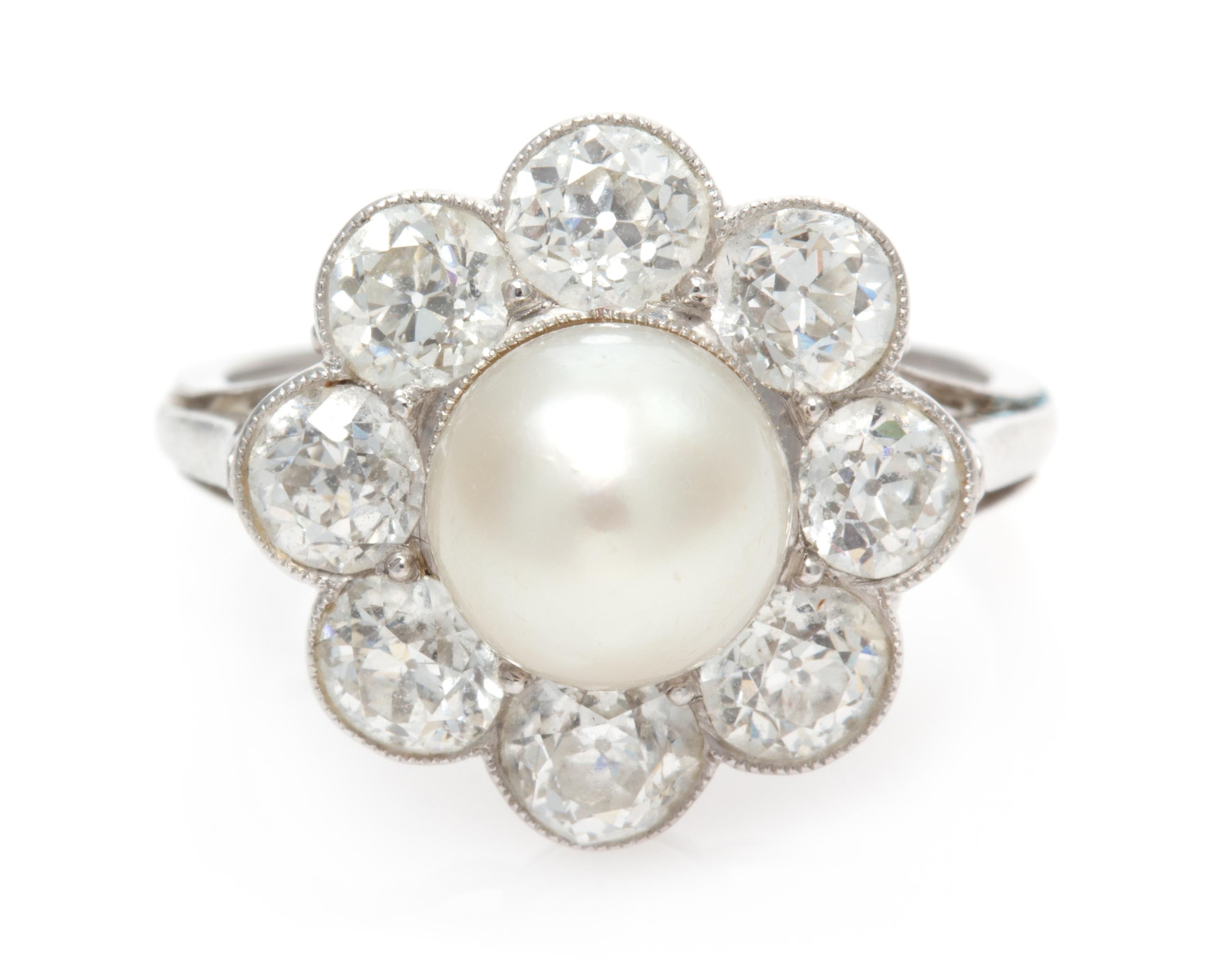 An Edwardian Platinum, Natural Pearl and Diamond Ring, 2.90 dwts.