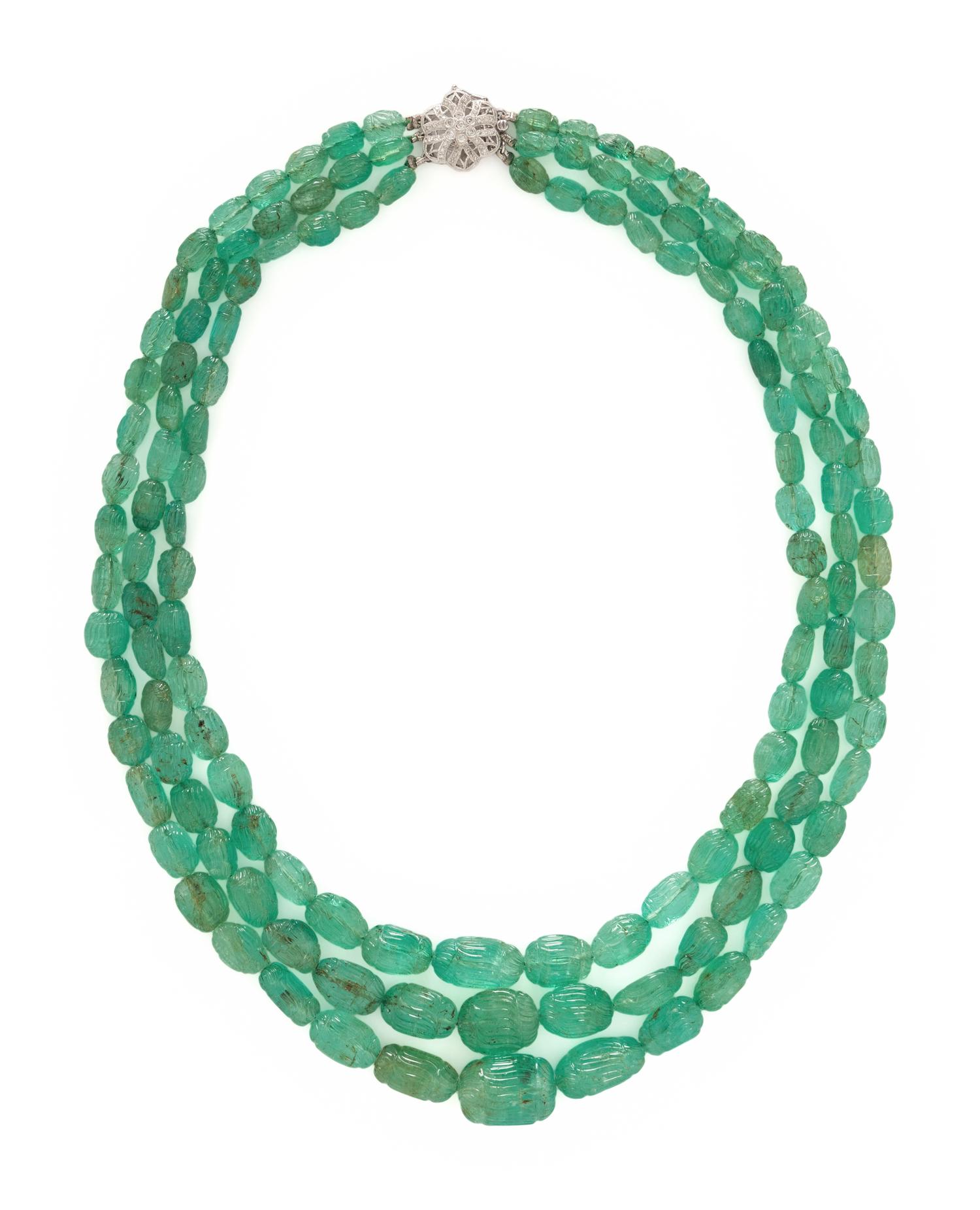 CARVED EMERALD, TRIPLE STRAND BEAD NECKLACE