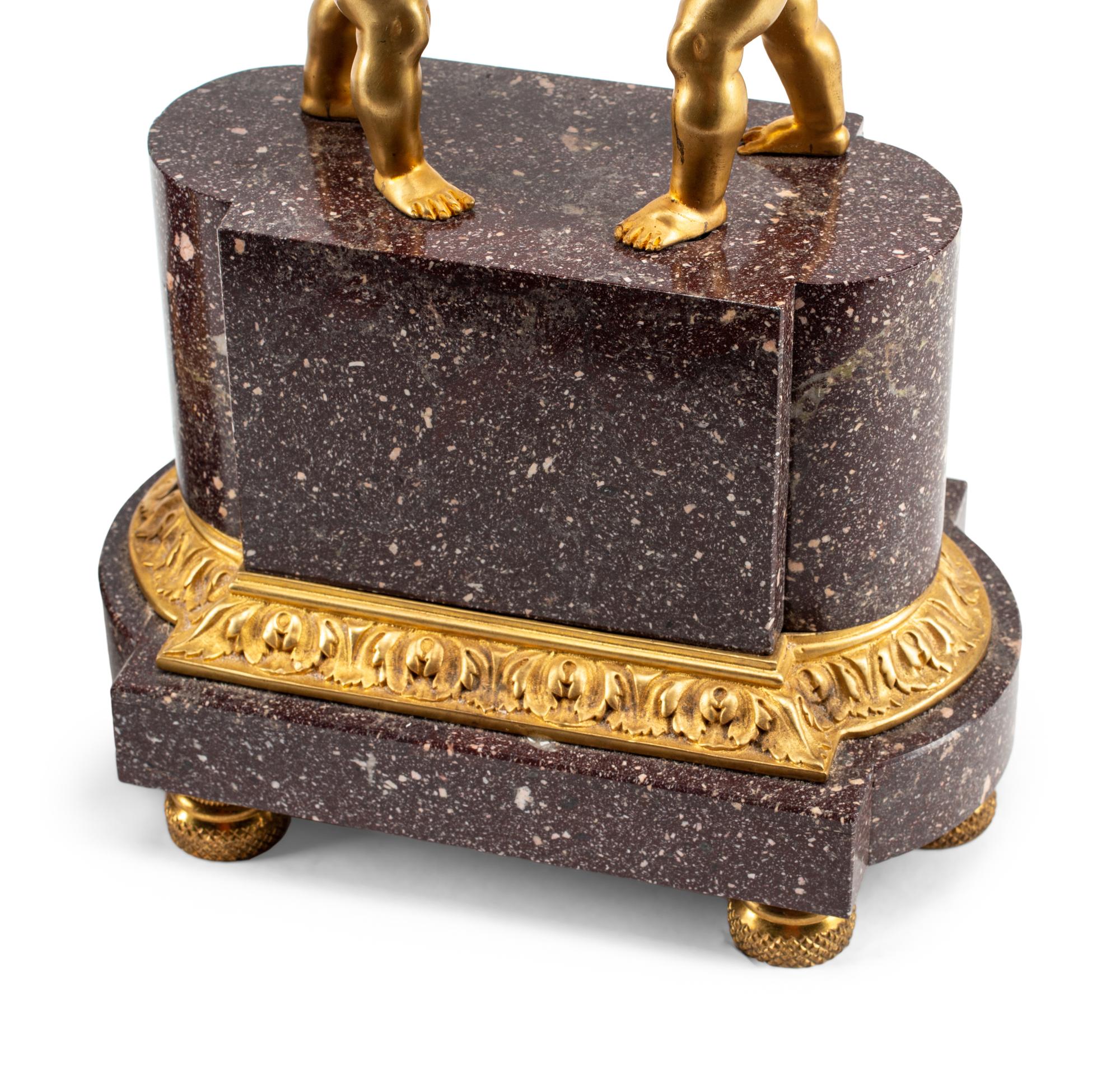 A Pair of Directoire Style Gilt Bronze and Marble Urn Ornaments