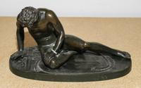 A Continental Bronze Figure, After the Antique Width 10 3/4 inches. — 19TH CENTURY