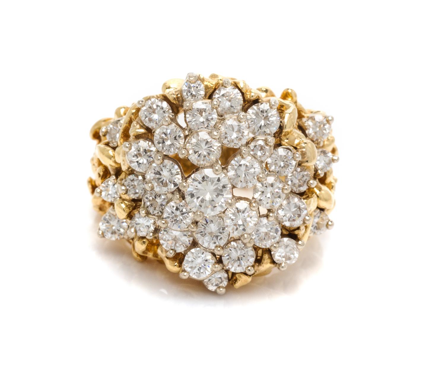 An 18 Karat Bicolor Gold and Diamond Ring, 13.00 dwts.