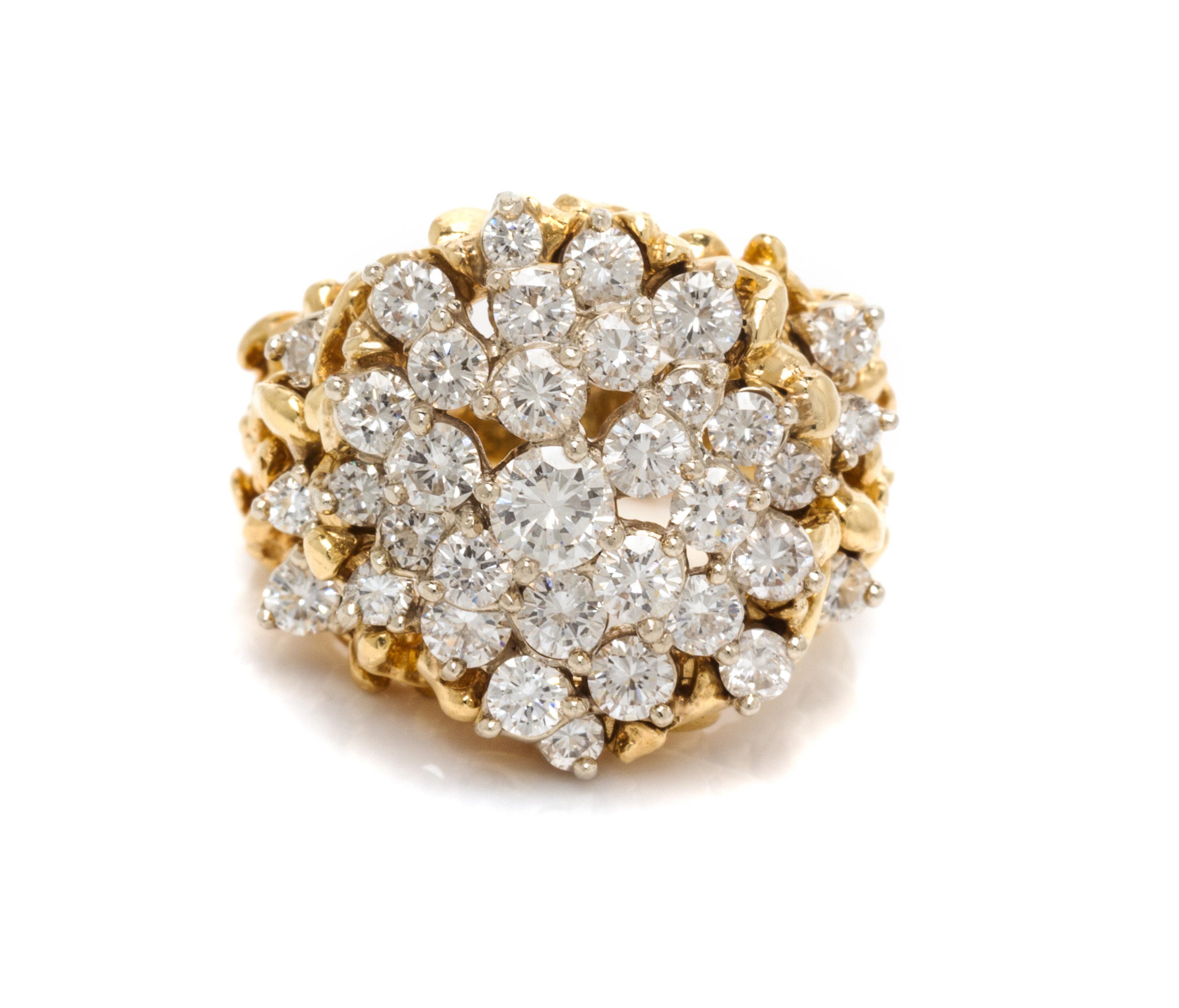An 18 Karat Bicolor Gold and Diamond Ring, 13.00 dwts.