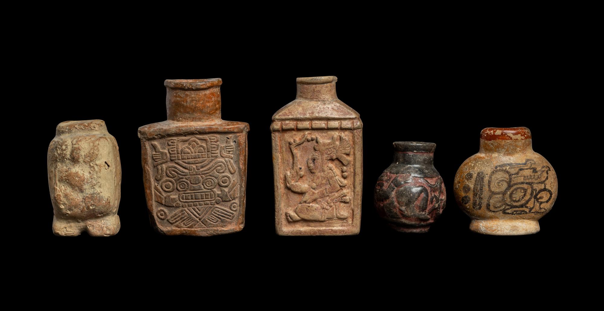 Four Maya Vessels with Glyphs and One Standing Figure