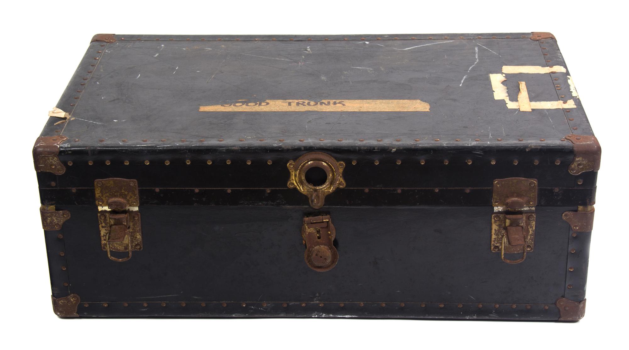 A Black Metal Steamer Trunk Height 12 1/2 inches x width 36 inches x depth 21 7/8 inches.