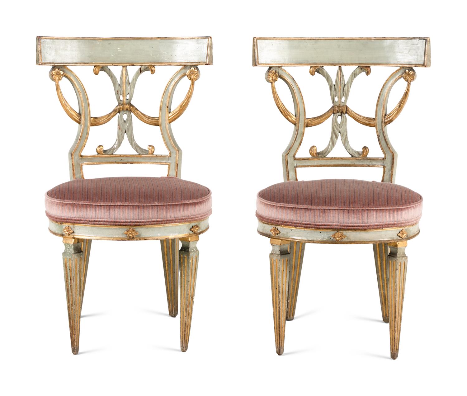 A Pair of Italian Neoclassical Blue Painted and Parcel Gilt Side Chairs
