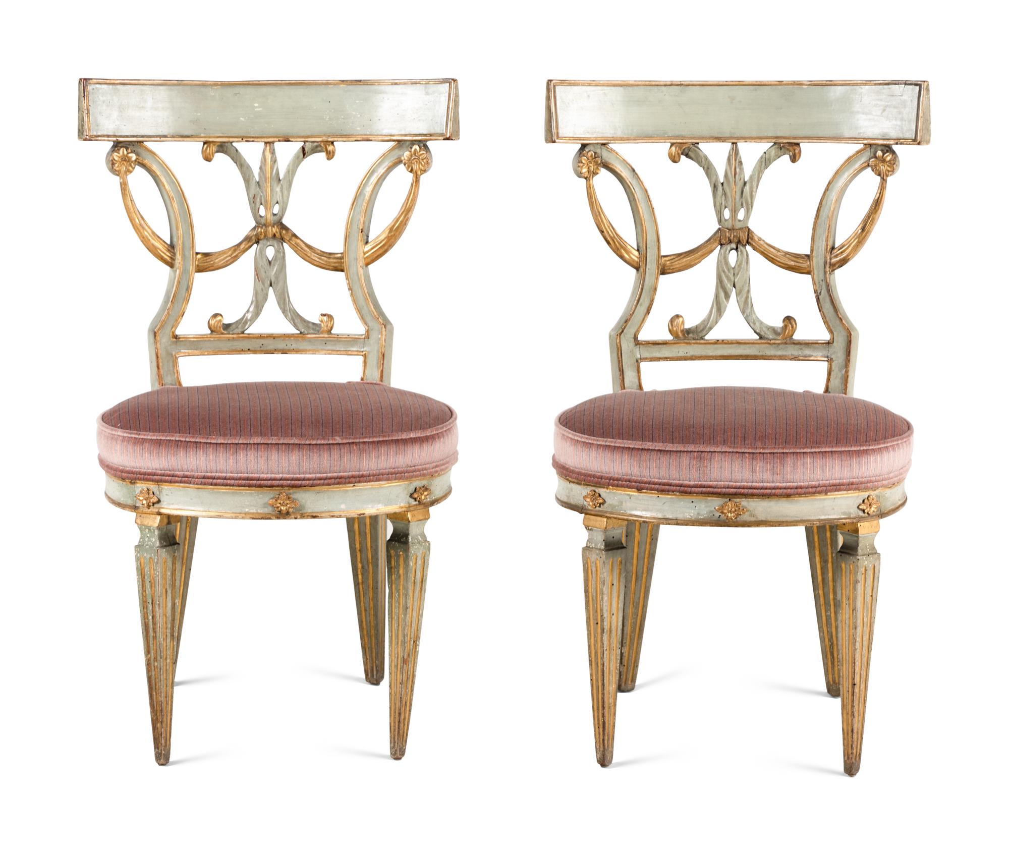 A Pair of Italian Neoclassical Blue Painted and Parcel Gilt Side Chairs