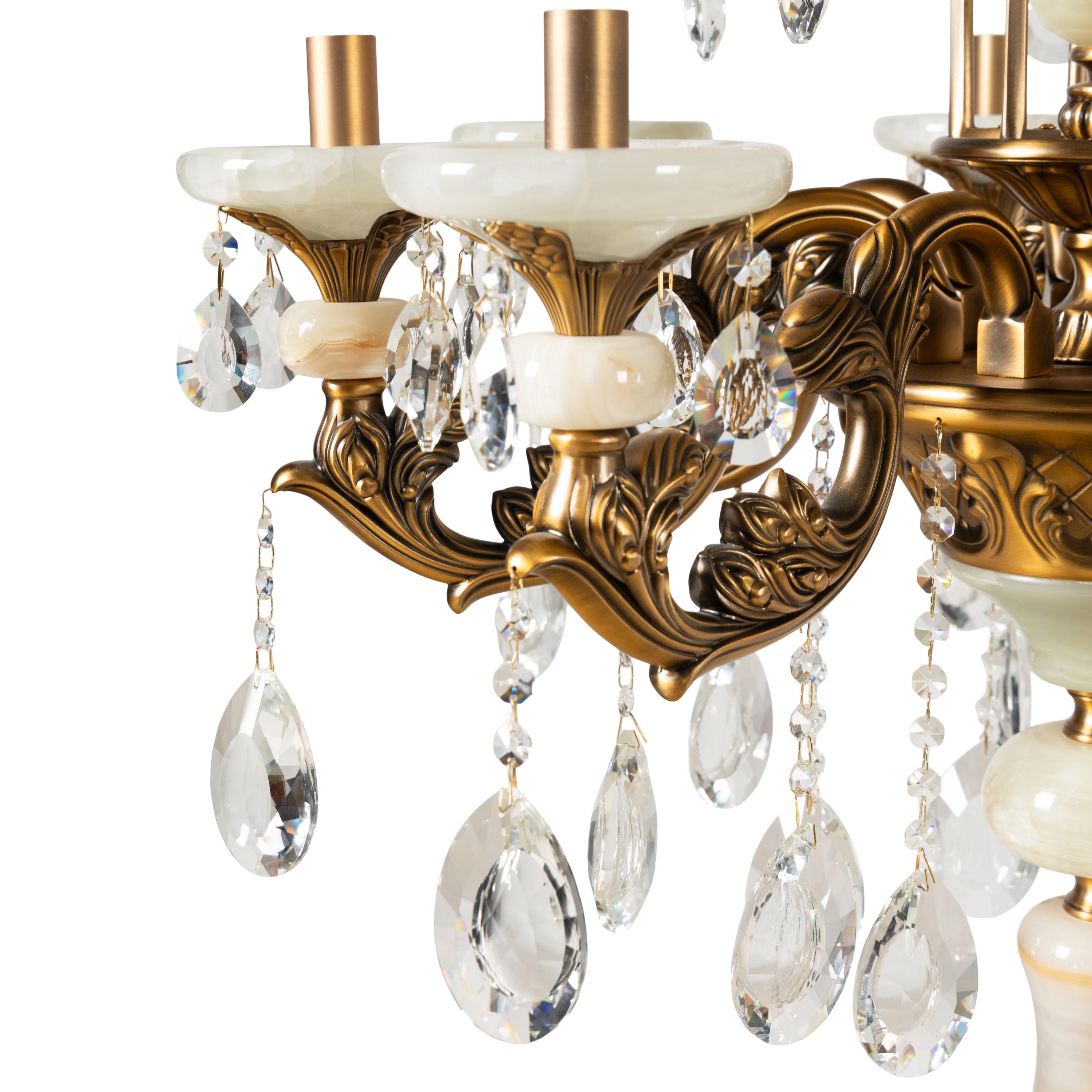 A Pair of Brass Mounted Onyx Nine-Light Torchères