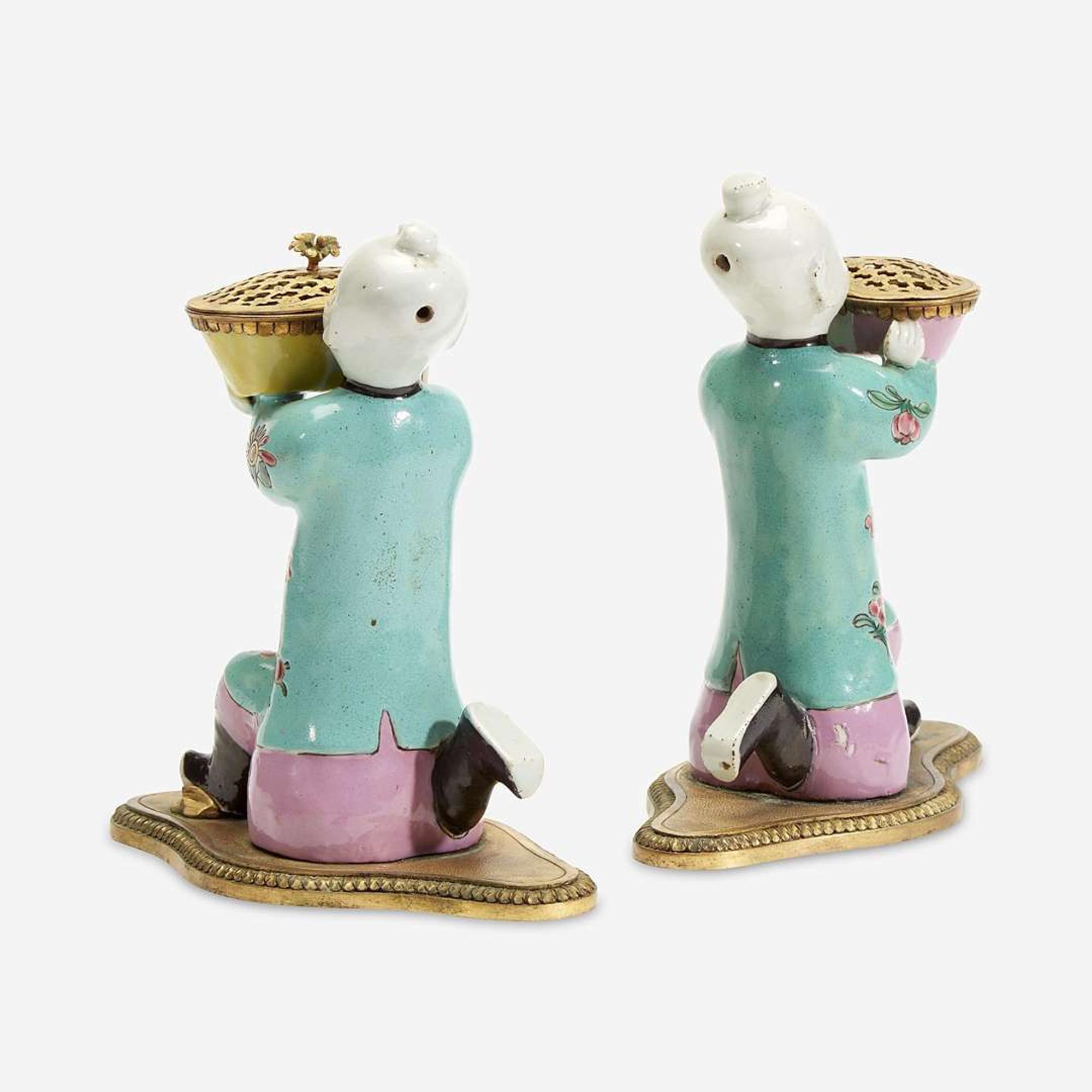 A Pair of Chinese Export Famille Rose Gilt Bronze-Mounted Figural Brûle Parfum The porcelain late 18th/early 19th century