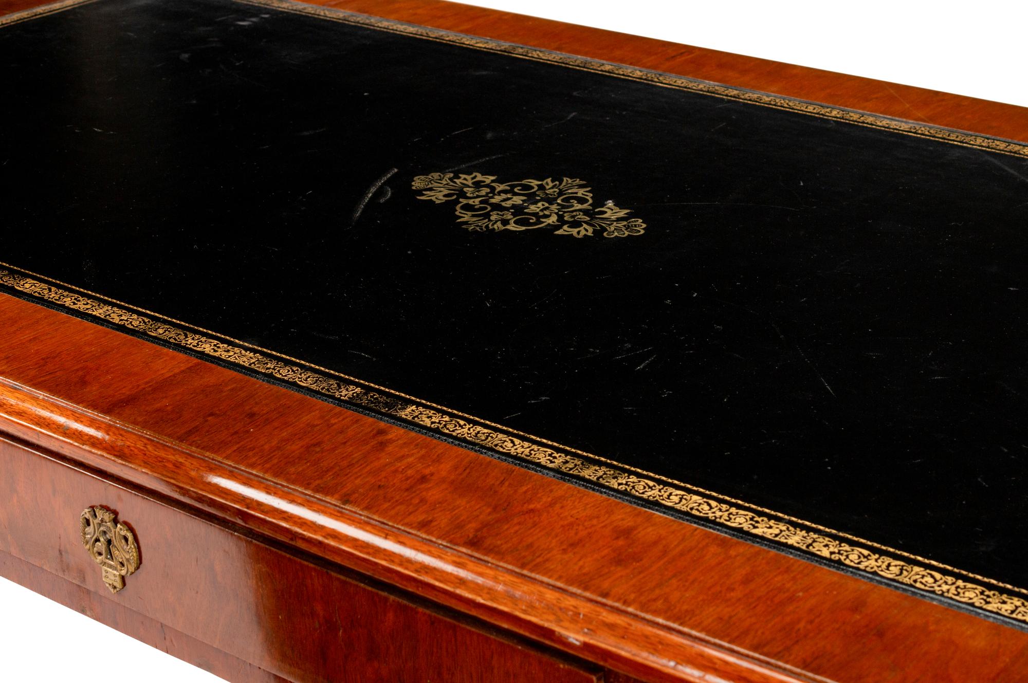 A Baltic Neoclassical Style Mahogany Desk and Chair