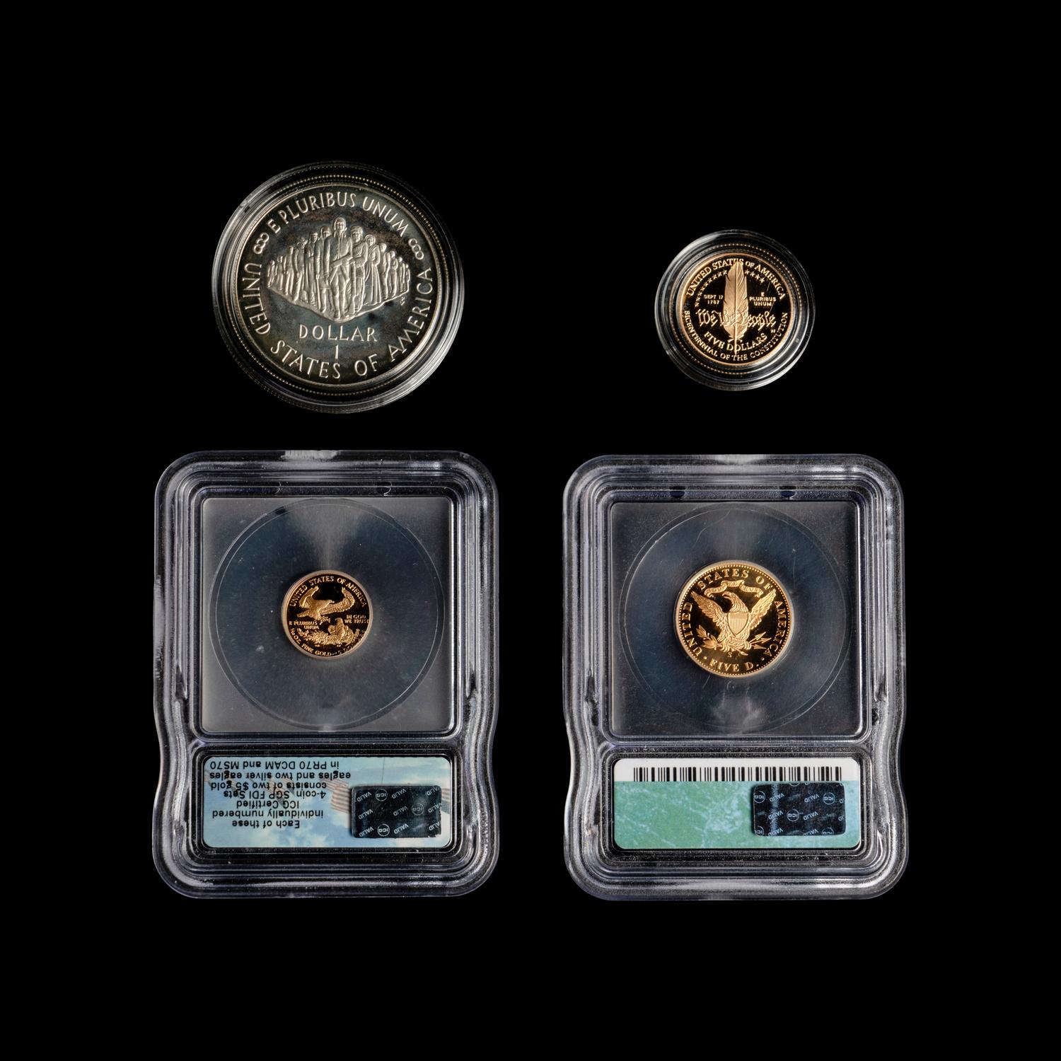 A Group of Four US Mint Issued Gold or Silver Coins