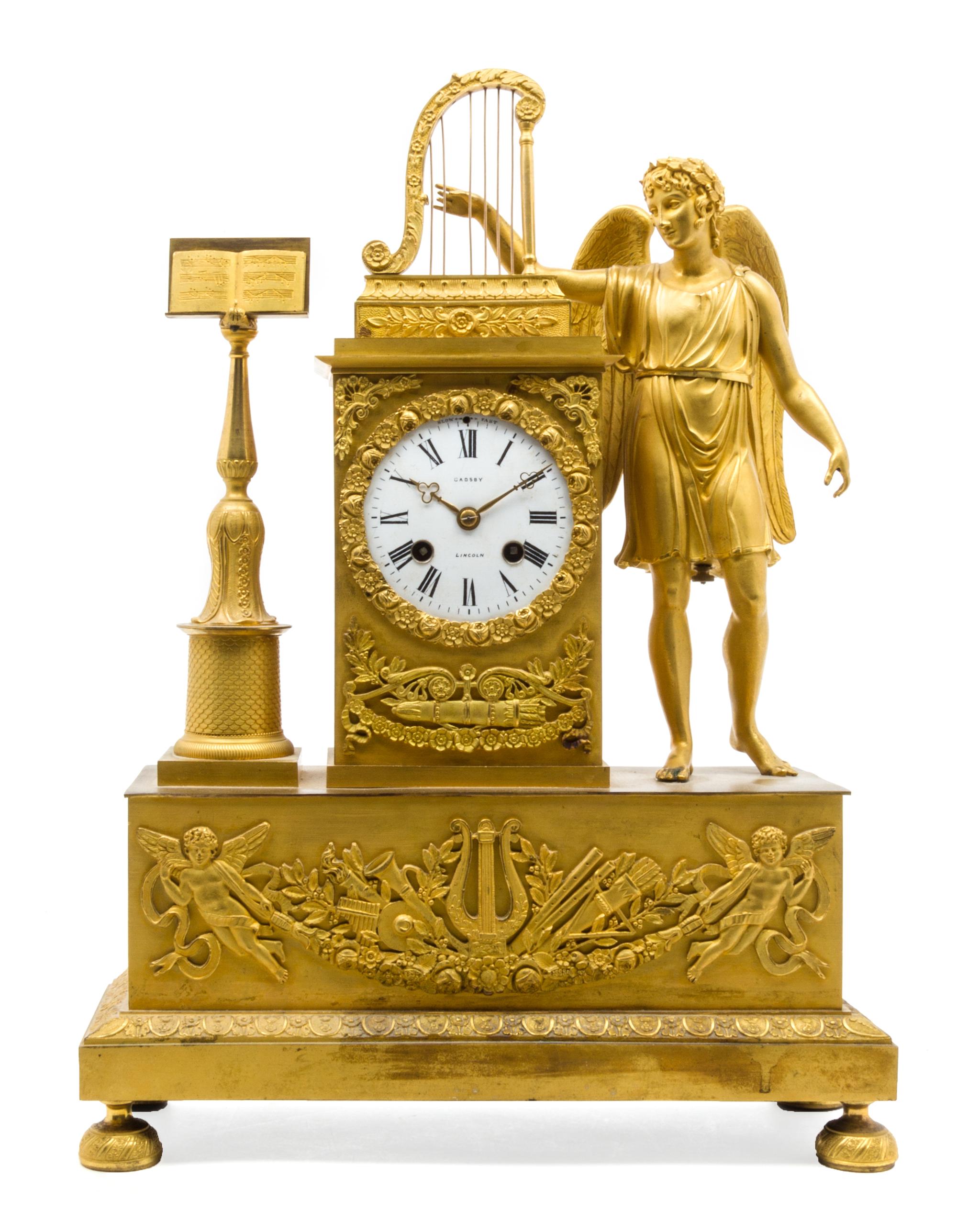 An Empire Style Gilt Bronze Mantel Clock Height 18 inches. — GADSBY, LINCOLN