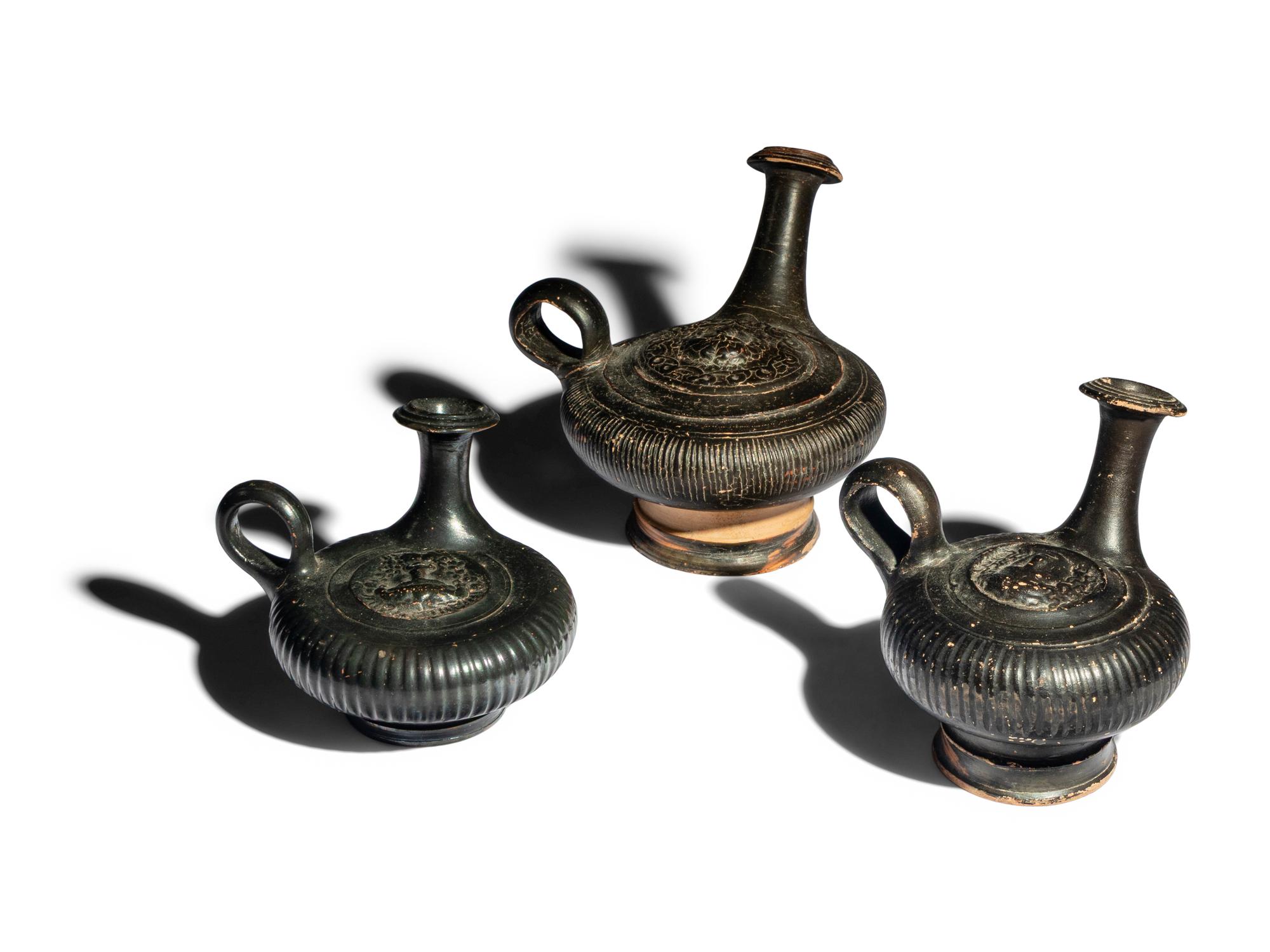 Three Campanian Calene-Ware Gutti