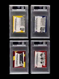 A Group of 4 Sealed Unopened 1970s and 1980s PSA Graded Topps Basketball Wax Packs